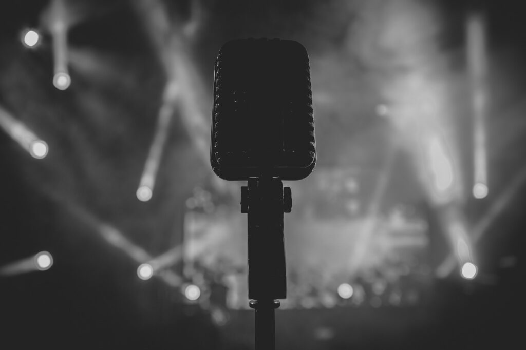 black and white, spotlight, microphone